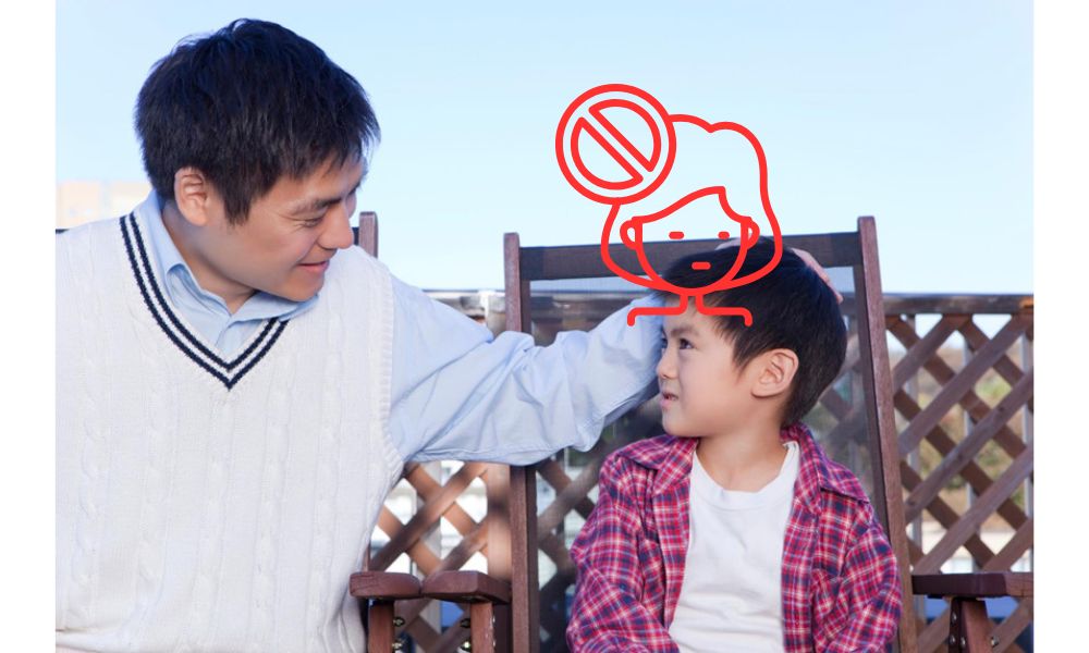 Không chạm vào đầu người khác